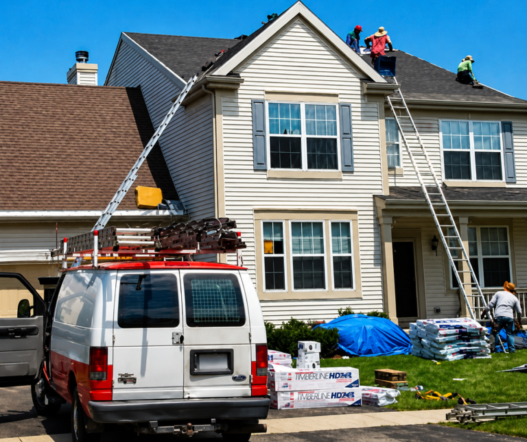 Roofing work on a suburban home